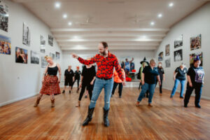 Dancers walk the line