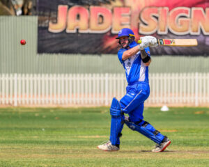 Dogs sink Robins to secure top spot
