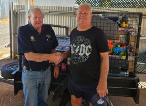 Winners and grinners at raffle draw