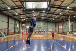 Dogs down Goats in basketball battle